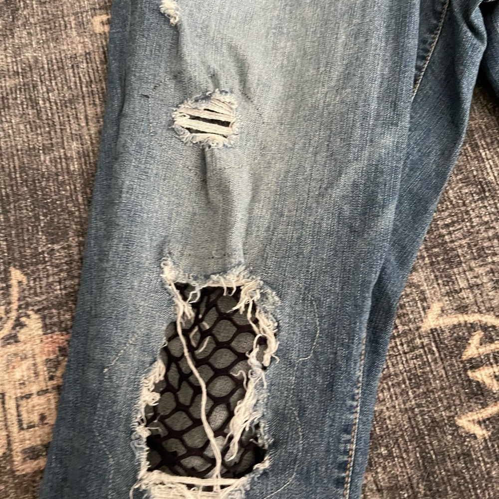 Distressed fishnet insert Torrid jeans!